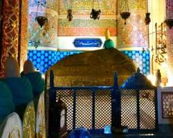 The sarcophagus of Mevlâna is covered with brocade which is embroidered with gold wires having verses from the Koran